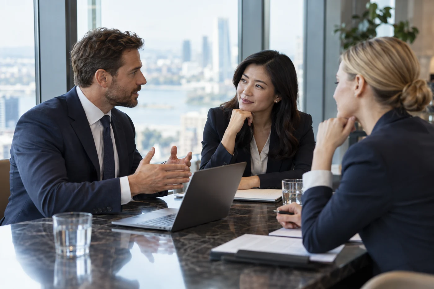 Business consultants in a focused conversation; illustrative image